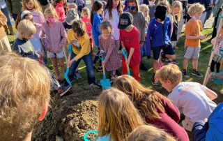 Tree Planting at Arbor Day celebration in Bluebird Park