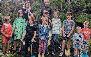 Children planting a tree in Boat Canyon Park for Arbor Day Celebration